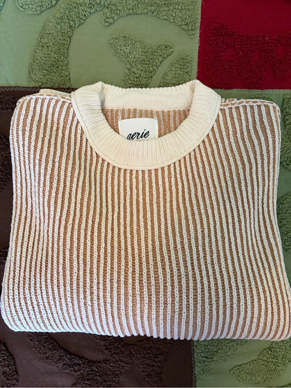 aerie Beyond Chenille Sweater in a striped tan and cream knit design.